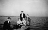 Peder, Aase, Grete and Figger on a Boat Ride