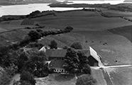 Aerial View of the Farmyard and Fields to the East, showing Gudsø Vig and Houens Odde